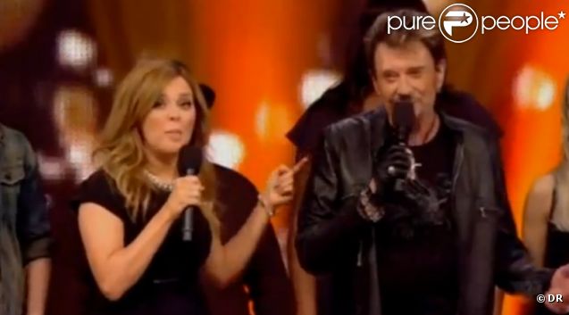 Johnny Hallyday et Julie Snyder sur le plateau de  Star Académie , à Montréal, le 5 février 2012.