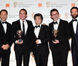 Russel Crowe, Jean Dujardin, Thomas Langmann, Michel Hazanavicius et Hugh Jackman lors des BAFTAs 2012, le 12 février à Londres.