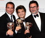 Jean Dujardin, Thomas Langmann et Michel Hazanavicius, lors des BAFTAs 2012, le 12 février à Londres.