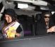 Russell Brand sort d'un salon de tatouages à Los Angeles avec sa chérie Nikolett Barabas, le 24 mars 2012