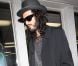 Russell Brand sort d'un salon de tatouages à Los Angeles le 24 mars 2012