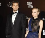 Diane Kruger habillée par Jason Wu, et son conjoint Joshua Jackson assistent à la soirée Carnaval d\'Haïti animée par Sean Penn. Cannes, le 18 mai 2012.