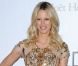 Karolina Kurkova, vêtue d'une robe transparente aux motifs dorés Roberto Cavalli, illuminait le gala de l'amfAR à l'hôtel du Cap Eden Roc. Cap d'Antibes, le 24 mai 2012.
