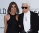 Carine Roitfeld au bras de Karl Lagerfeld lors du gala de l'amfAR à l'hôtel du Cap Eden Roc. Cap d'Antibes, le 24 mai 2012.