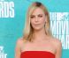 Charlize Theron en total look Lanvin et sandales Jimmy Choo à Los Angeles pour les MTV Movie Awards. Le 3 juin 2012.
