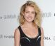 Natalia Vodianova, habillée d'une robe prêt-à-porter Versace lors des Glamour Awards 2012. Londres, le 29 mai 2012.