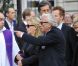 François Boulain et son fils Gary lors des obsèques de leur mari et père Thierry Roland le 21 juin 2012 en l'église Sainte-Clotilde à Paris
