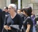 Raymond Domenech et Estelle Denis lors des obsèques de Thierry Roland le 21 juin 2012 en l'église Sainte-Clotilde à Paris