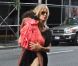 Heidi Klum adopte le look baba cool. New York, le 28 juillet 2012.