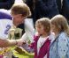 Les princes William et Harry disputaient le 5 août 2012 un match de polo caritatif au profit de trois associations qu'ils soutiennent, lors du Jerudong Trophy, dans les Costwolds.