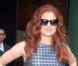 Debra Messing devant les studios de NBC pour l'émission  Good Morning America , à New York, le 22 août 2012.
