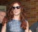 L'actrice Debra Messing devant les studios de NBC pour l'émission  Good Morning America , à New York, le 22 août 2012.