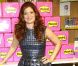 L'actrice Debra Messing dans une école élémentaire pour promouvoir la marque Post-it, à New York, le 22 août 2012.