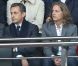 Nicolas Sarkozy et son fils Pierre, attentifs dans les gradins du Parc des Princes, assistent à la victoire du Paris Saint-Germain face à Sochaux. Paris, le 29 septembre 2012.