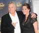 Richard Dean Anderson et Amanda Tapping, complices, reçoivent le Jules Verne Award lors du Festival Jules Verne 2012 au Grand Rex, le 10 octobre 2012