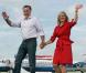 Republican presidential nominee Mitt Romney and his wife Ann, right, wave to cheering supporters as they take the stage at a send-off rally on the tarmac at the airport in Lakeland, FL, USA, Friday, August 31, 2012. After the Lakeland event, Romney was slated to fly to New Orleans to tour hurricane damage. Photo by oe Burbank/Orlando Sentinel/MCT/ABACAPRESS.COM01/09/2012 - Lakeland