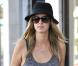 Nicky Hilton à Los Angeles, porte des bottines "Otway" d'Isabel Marant et un sac Valentino en accessoires de son débardeur gris et sa petite jupe. Le 16 octobre 2012.