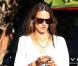 Alessandra Ambrosio à Beverly Hills, porte un chemisier blanc sur un mini-short One Teaspoon, des bottines beiges et un sac Céline. Le 16 octobre 2012.