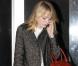 Exclusif - Emma Stone, craquante avec son manteau Maje et un sac Burberry au bras à Los Angeles. Le 17 octobre 2012.