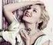 Kirsten Dunst photographiée par Inez et Vinoodh pour le parfum Mon Jasmin Noir de Bulgari.