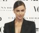 Irina Shayk, ultra sexy dans son costume Yves Saint Laurent, assiste à la soirée lancement du Vogue España de décembre 2012 au palais Fernán Núñez. Madrid, le 27 novembre 2012.