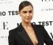 Irina Shayk, ultra sexy dans son costume Yves Saint Laurent, assiste à la soirée lancement du Vogue España de décembre 2012 au palais Fernán Núñez. Madrid, le 27 novembre 2012.