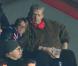 Guy Carlier et son fils lors du match entre le PSG et Evian Thonon Gaillard au Parc des Princes à Paris le 8 décembre 2012 à Paris (victoire du PSG 4-0)