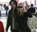 Sharon Stone, son petit ami Martin Mica et ses fils Roan, Laird et Quinn à l'aéroport de Los Angeles, le 23 décembre 2012.