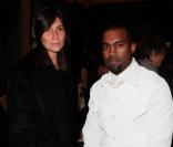 Emmanuelle Alt, rédactrice en chef du magazine Vogue Paris et Kanye West assistent au défilé haute couture Maison Martin Margiela printemps-été 2013 à Paris. Le 23 janvier 2013.