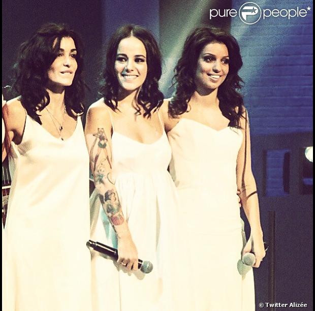 Jenifer, Alizée et TAL lors de la boîte à musique des Enfoirés à Bercy