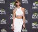 Le top model Karlie Kloss porte un ensemble Cushnie et Ochs collection printemps 2013 et des sandales Gucci aux MTV Movie Awards. Los Angeles, le 14 avril 2013.