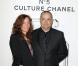 Jean-Pierre Jeunet et sa femme Lisa à l'exposition "N°5 Culture Chanel" au Palais de Tokyo à Paris le 3 mai 2013. L'exposition "N°5 Culture Chanel" retrace l'histoire et les secrets, jusqu'alors bien gardés, du mythique parfum de la maison Chanel.