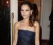 Virginie Ledoyen débarque à la soirée Planet Finance dans le grand salon du Carlton à l'occasion du 66e Festival de Cannes le 16 mai 2013.