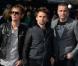 Muse pose à la première mondiale de World War Z, à l'Empire Leicester Square, Londres, le 2 juin 2013.