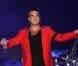 Robbie Williams sur la scène du Wembley Stadium lors de l'événement  Capital FM's Summertime Ball  à Londres, le 9 juin 2013.