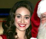 Emily Rossum (Le fantôme de l’Opéra) et le Père Noël made in Vegas. 