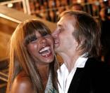 Le dj David Guetta rencontre aux Bains Douches Cathy. Rapidement, ils deviennent un couple incontournable de la scène House. Entre 2 soirées de mix à Ibiza ou Miami, ils ont eu le temps d'avoir 2 enfants en 2004 et 2007.