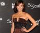 Eva Longoria, très élégante dans sa robe longue chocolat à décolleté pigeonnant...