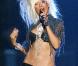 Nous ne pouvions terminer ces nominations des meilleures performances scéniques sans quelques petits bonus... Nominée dans cette catégorie, Christina Aguilera, mi-femme mi-...lionne aux MTV Music Awards en 2003.