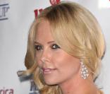 La comédienne sud-africaine Charlize Theron, 33 ans, a débuté comme mannequin. 