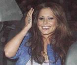 Cheryl Cole sort de son hôtel, à Londres.