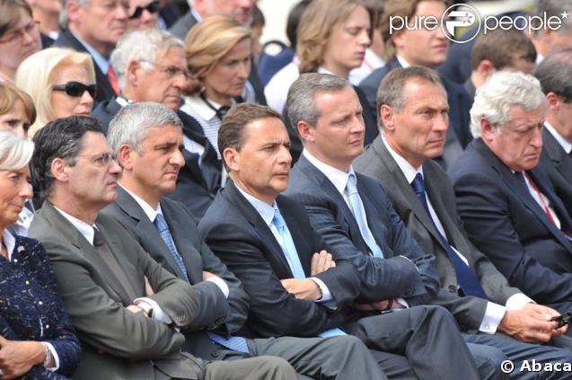 Pierre et Jean Sarkozy lors de la cérémonie en hommage à ceux qui sont morts pour la France. Cimetière de Colleville-sur-mer, le 6 juin.