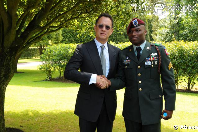 Pierre et Jean Sarkozy lors de la cérémonie en hommage à ceux qui sont morts pour la France. Cimetière de Colleville-sur-mer, le 6 juin.