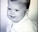 Brad Pitt lorsqu'il était enfant. Il aimait déjà les coiffures dans le vent. 