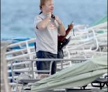 David Caruso et son amie Amina Tyrone sur une plage de Miami : un bonheur radieux
