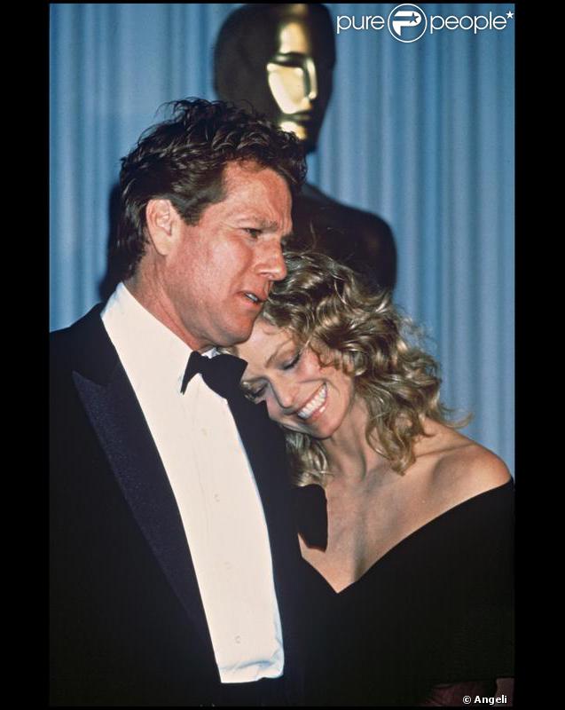 Ryan O'Neal et Farah Fawcett en 1989 