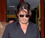 Johnny Depp à la sortie d'un restaurant après l'enregistrement du Late Show with David Letterman le 27 juin 2009