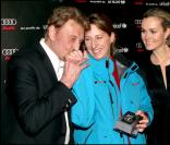 Johnny Hallyday, Maud Fontenoy et Laeticia Hallyday à la vente aux enchères organisée au profit de l'Unicef, à Val d'Isère