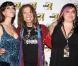 Steven Tyler fait son arrivée avec sa compagne Erin et sa fille Mia à l'after party du concert d'Aerosmith au MGM Grand, le 26 juillet 2009
