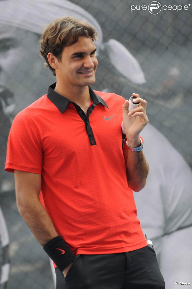 Bryant Park, New York, le 26 août 2009 : Roger Federer participe à l'US Open Experience avec de jeunes joueurs des environs